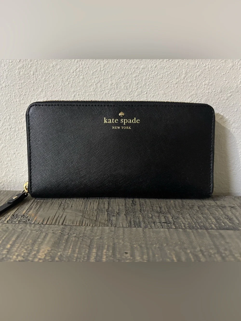 kate spade Black Zip Around Saffiano Wallet with Gold Logo